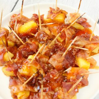 Bacon Wrapped Pineapple is an easy appetizer recipe.  Use a few staple items to create a flavourful sauce and use some gluten free bacon.