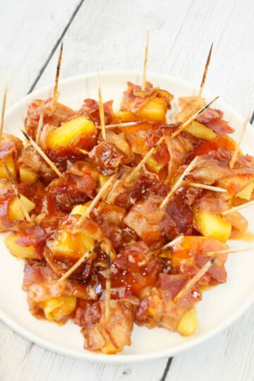 Bacon Wrapped Pineapple is an easy appetizer recipe. Use a few staple items to create a flavourful sauce and use some gluten free bacon.