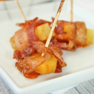 Bacon Wrapped Pineapple is an easy appetizer recipe.  Use a few staple items to create a flavourful sauce and use some gluten free bacon.