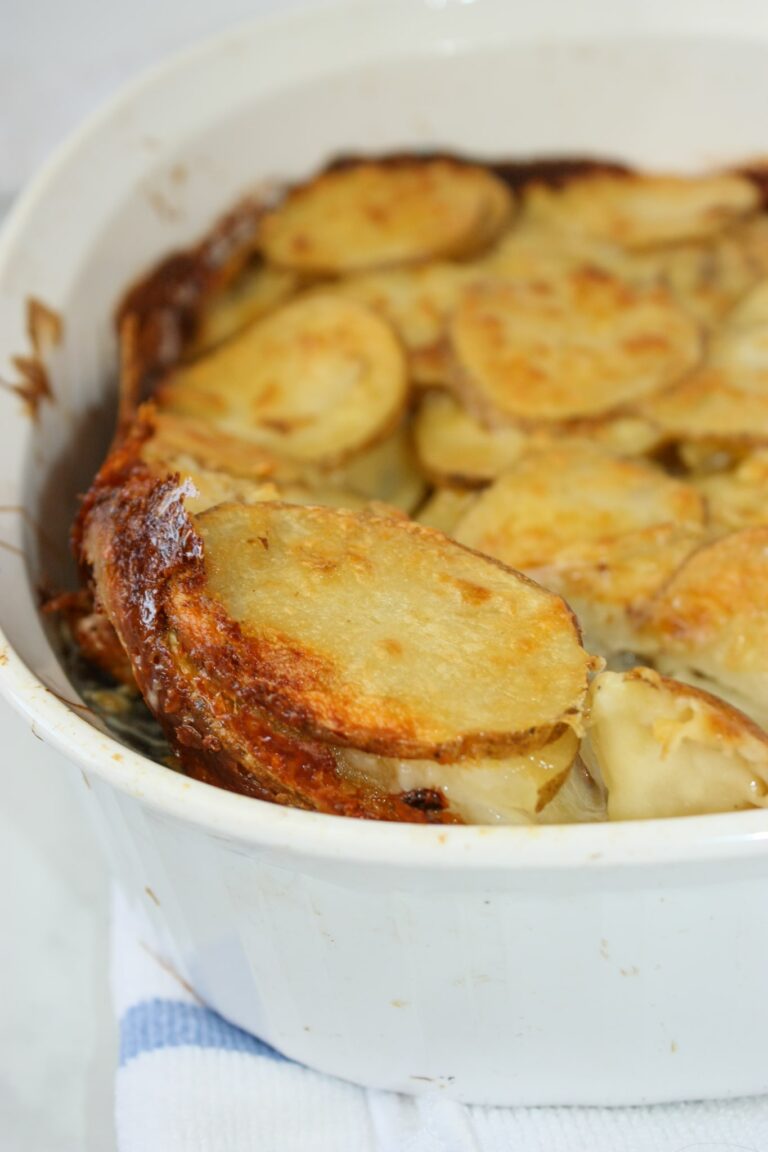 Gluten Free Au Gratin Potatoes is a cheesy comfort food casserole.   This potatoes casserole can be added as a side dish any day of the week.