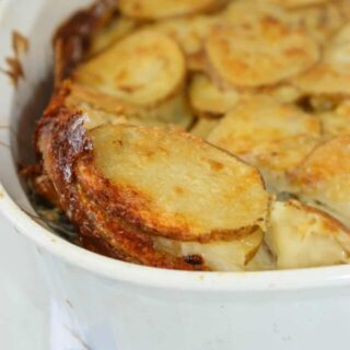 Gluten Free Au Gratin Potatoes is a cheesy comfort food casserole.   This potatoes casserole can be added as a side dish any day of the week.