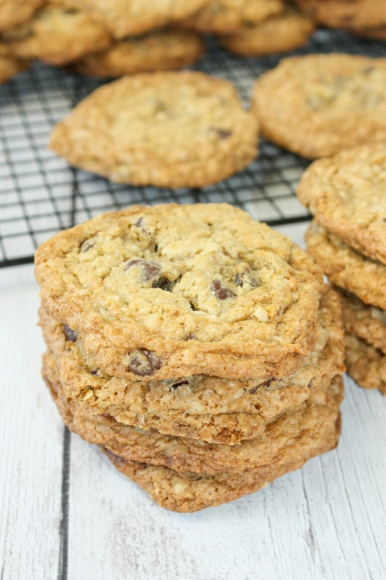 Gluten Free Cowboy Cookies are loaded with flavour.  These large cookies use gluten free oats, coconut, pecans and a hint of cinnamon to create a chewy, flavourful snack.