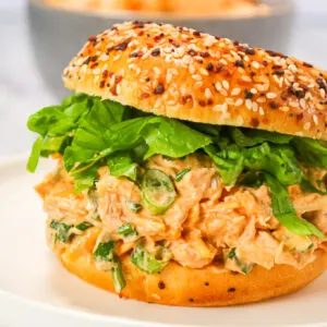 Buffalo Chicken Salad is a delicious recipe using rotisserie chicken, chopped green onions and shredded cheddar cheese all tossed in mayo, Buffalo sauce and ranch dressing.