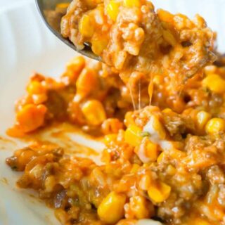 One Pot Mexican Ground Beef and Rice is a stove top dinner recipe loaded with ground beef, rice, salsa, corn and cheese. This cheesy ground beef and rice casserole is an easy dinner recipe perfect for weeknights.