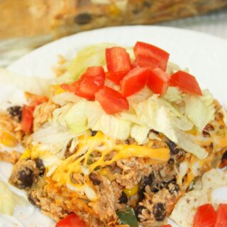 Chicken Taco Casserole with Rice is a delicious and hearty one dish meal.  This gluten free dinner recipe is loaded with flavour and textures that will delight any palate.