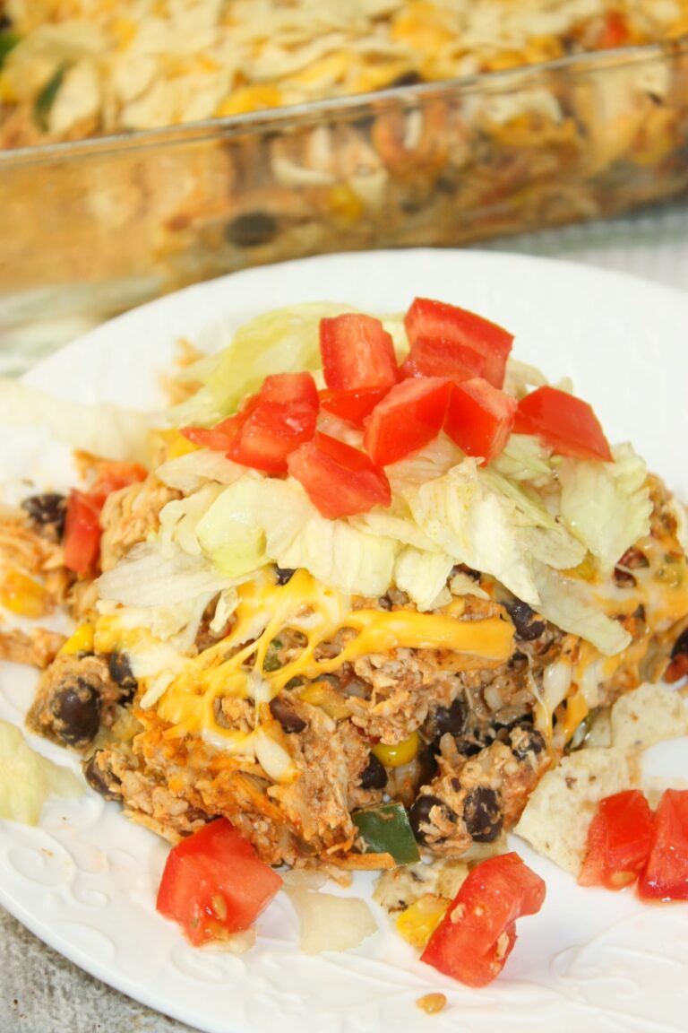 Chicken Taco Casserole with Rice is a delicious and hearty one dish meal.  This gluten free dinner recipe is loaded with flavour and textures that will delight any palate.