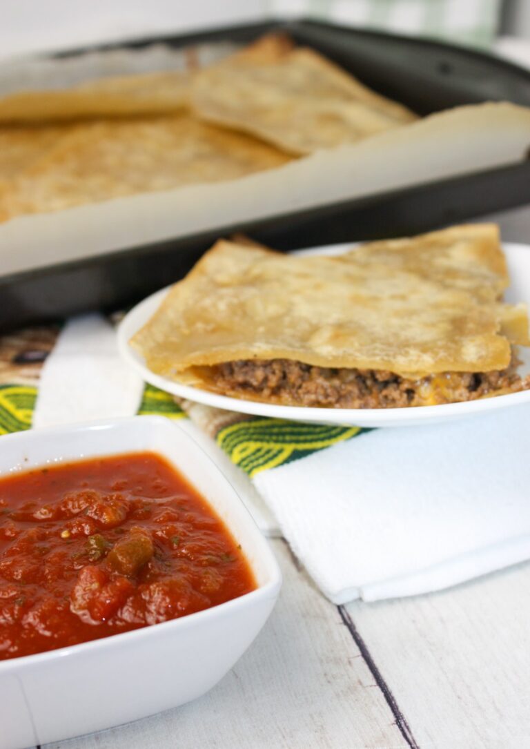 Ground Beef Quesadilla Casserole is an easy way to make quesadillas for the whole family.  This casserole recipe is loaded with flavour and is also a recipe that you can easily modify to suit your tastes.