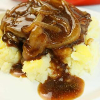 This Salisbury Steak recipe is an easy and quick option to prepare at the end of your day.  Ground meat loaded with onions and seasonings will delight your taste buds.  