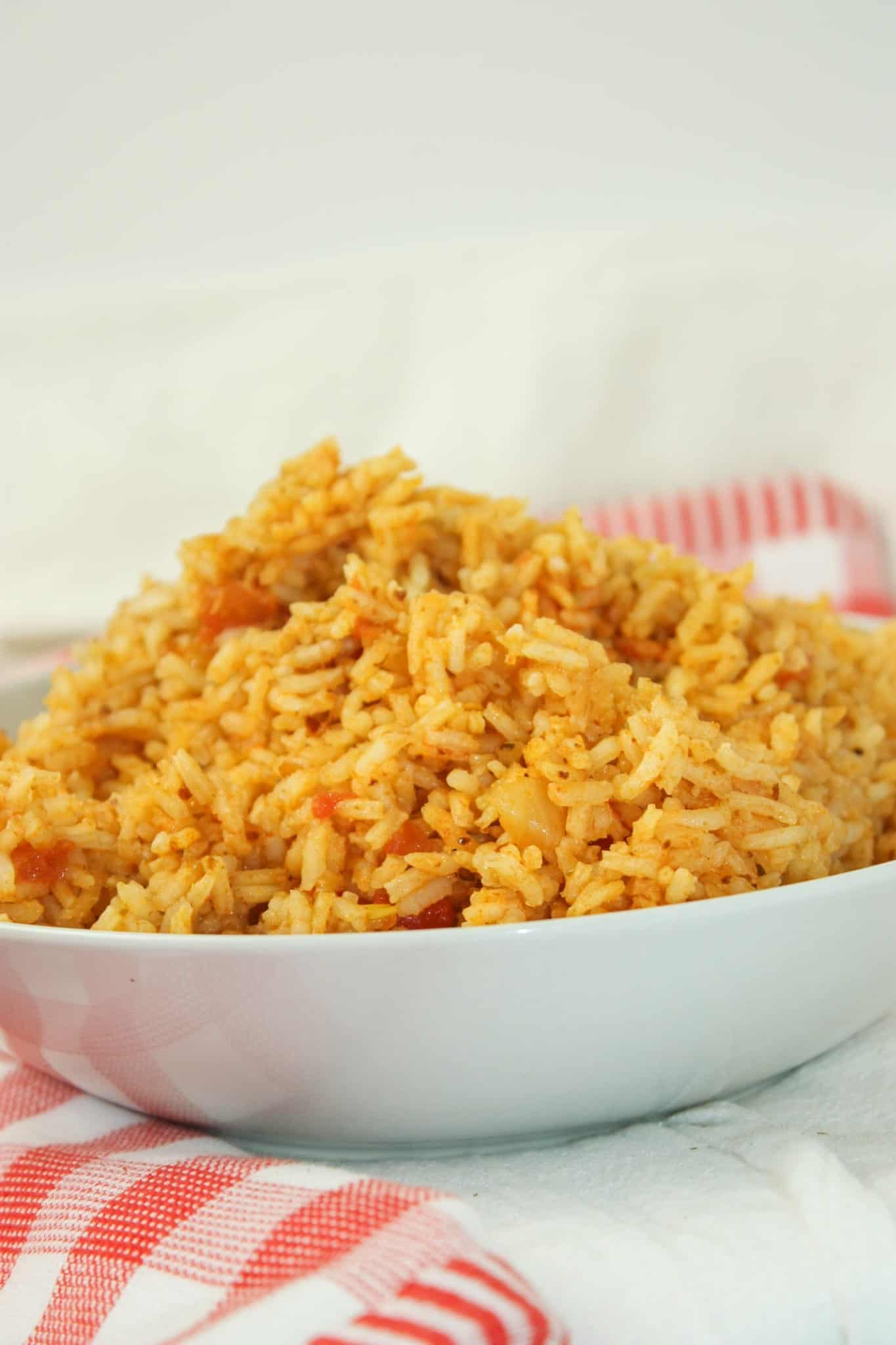 Gluten Free Spanish Rice is a flavourful side dish.  This fluffy rice dish is the perfect complement to a variety of meals.