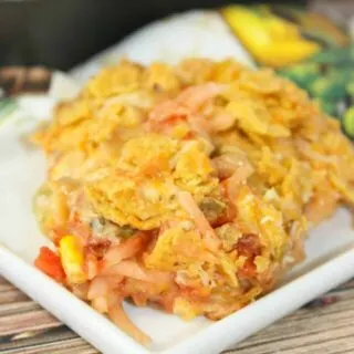 Mexican Potato Casserole is an easy side dish that is sure to be a hit with young and old alike! &nbsp; The crispy topping is the perfect complement to the cheesy, potato base.