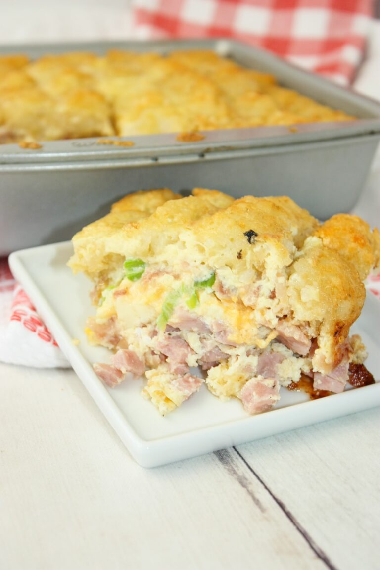 Gluten Free Tater Tot Breakfast Casserole is an easy recipe that is loaded with crunchy Tater Tots and cooked ham.  Eggs mixed with seasonings provide the perfect complement to the Tater Tots in this casserole.