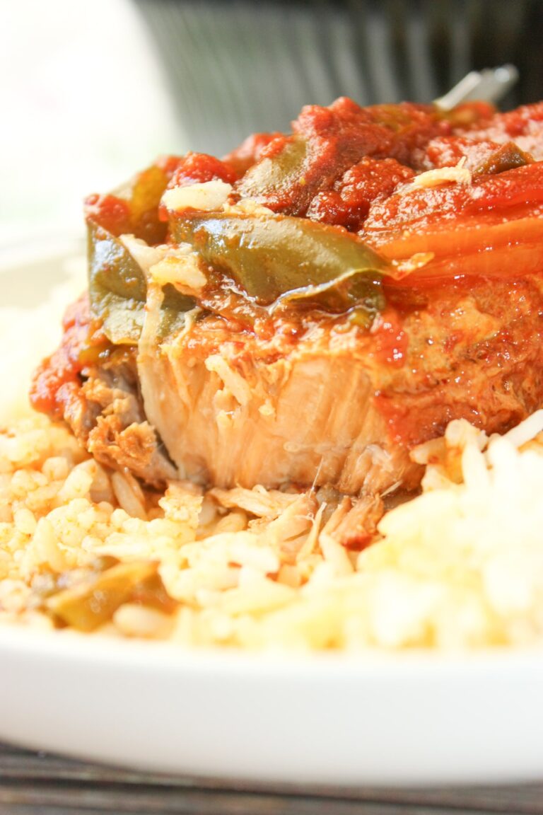 Crock Pot Spicy Pork Chops is an easy slow cooker recipe for any time of the year.  Boneless pork chops smothered in a flavourful tomato sauce makes a wonderful comfort food main course.