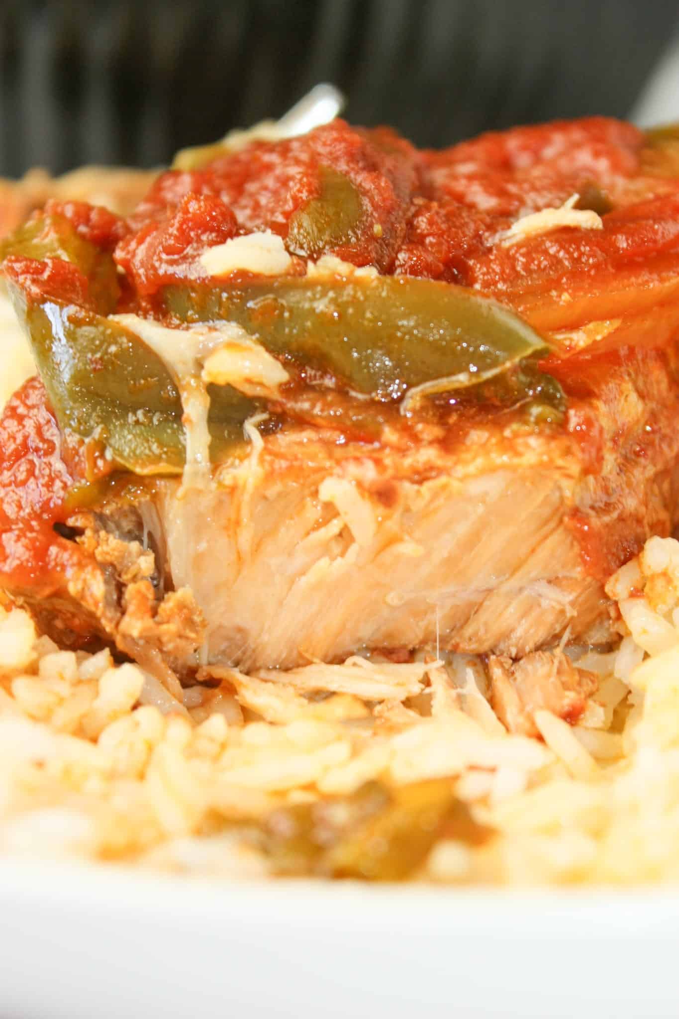 Crock Pot Spicy Pork Chops is an easy slow cooker recipe for any time of the year.  Boneless pork chops smothered in a flavourful tomato sauce makes a wonderful comfort food main course.