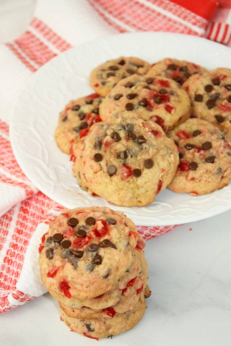 Maraschino Cherry Cookies are a colourful and delicious snack.  This soft, gluten free cookie is a great snack any day of the year but makes a great addition to Christmas baking trays.