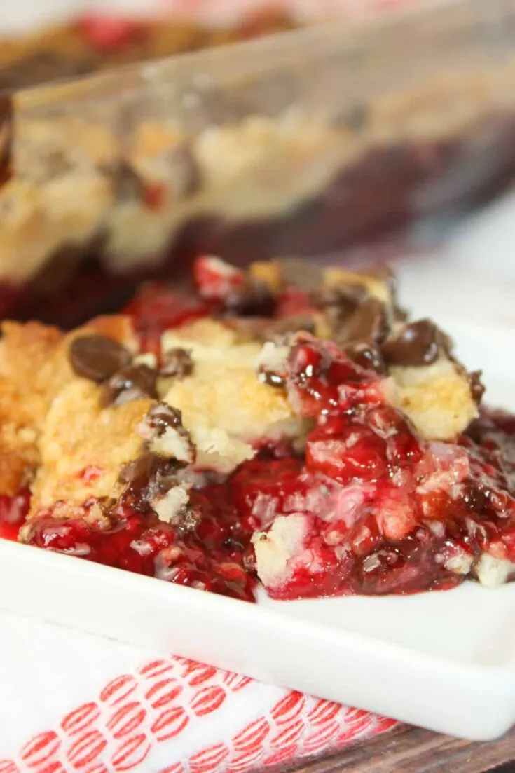 Raspberry Dump Cake is a very quick and flavourful recipe that will be enjoyed by young and old alike. Grab some raspberry pie filling and a gluten free cake mix and get ready to bake!