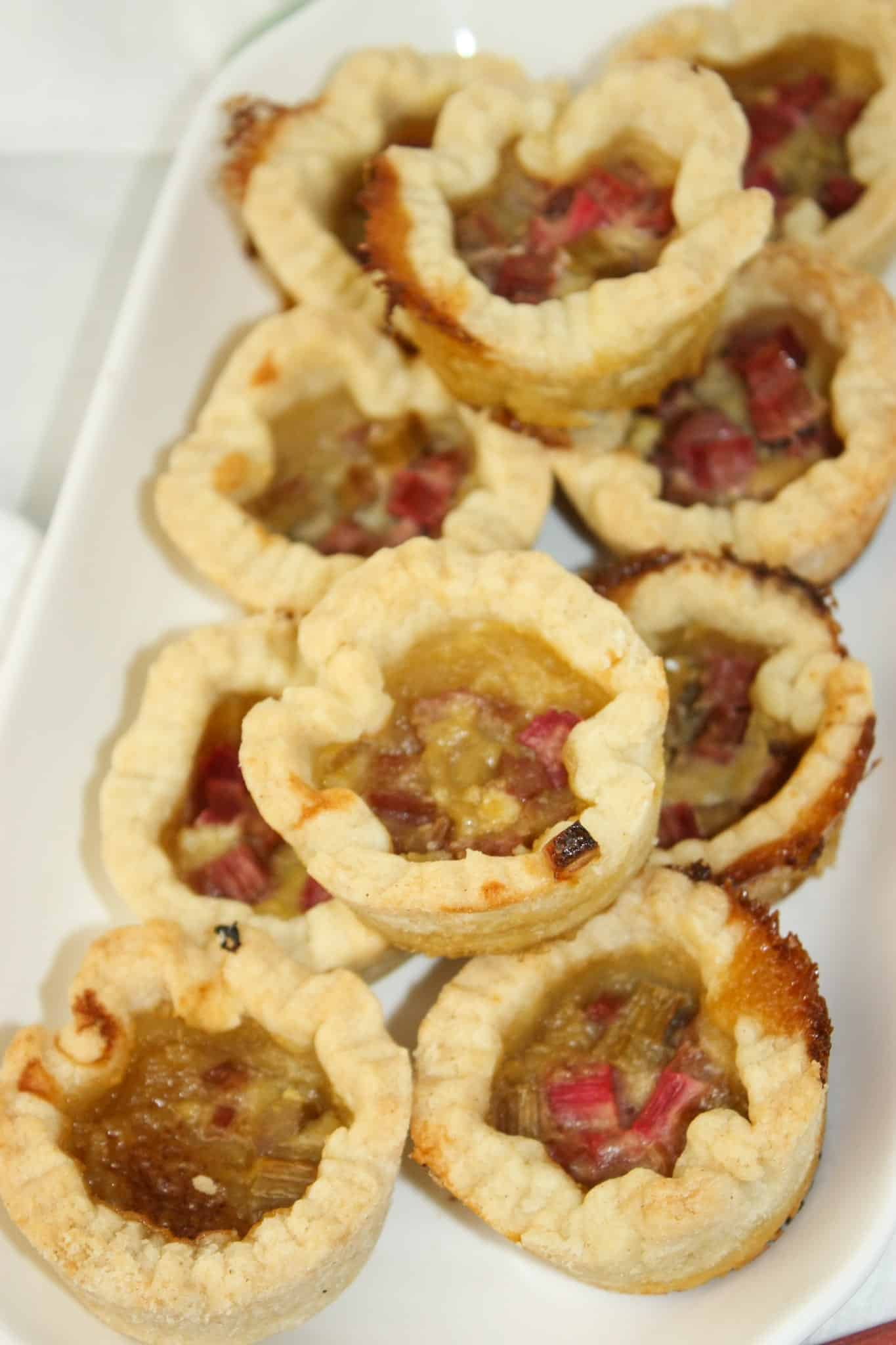 Rhubarb Butter Tarts are a delicious variation of the classic Canadian butter tart. These tarts combine the sweet, gooey filling of traditional butter tarts with the tangy flavor of rhubarb.  