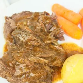 Crock Pot Spicy Pot Roast is a flavorful and tender dish made by slow-cooking a beef roast with a blend of seasonings and liquid over several hours.