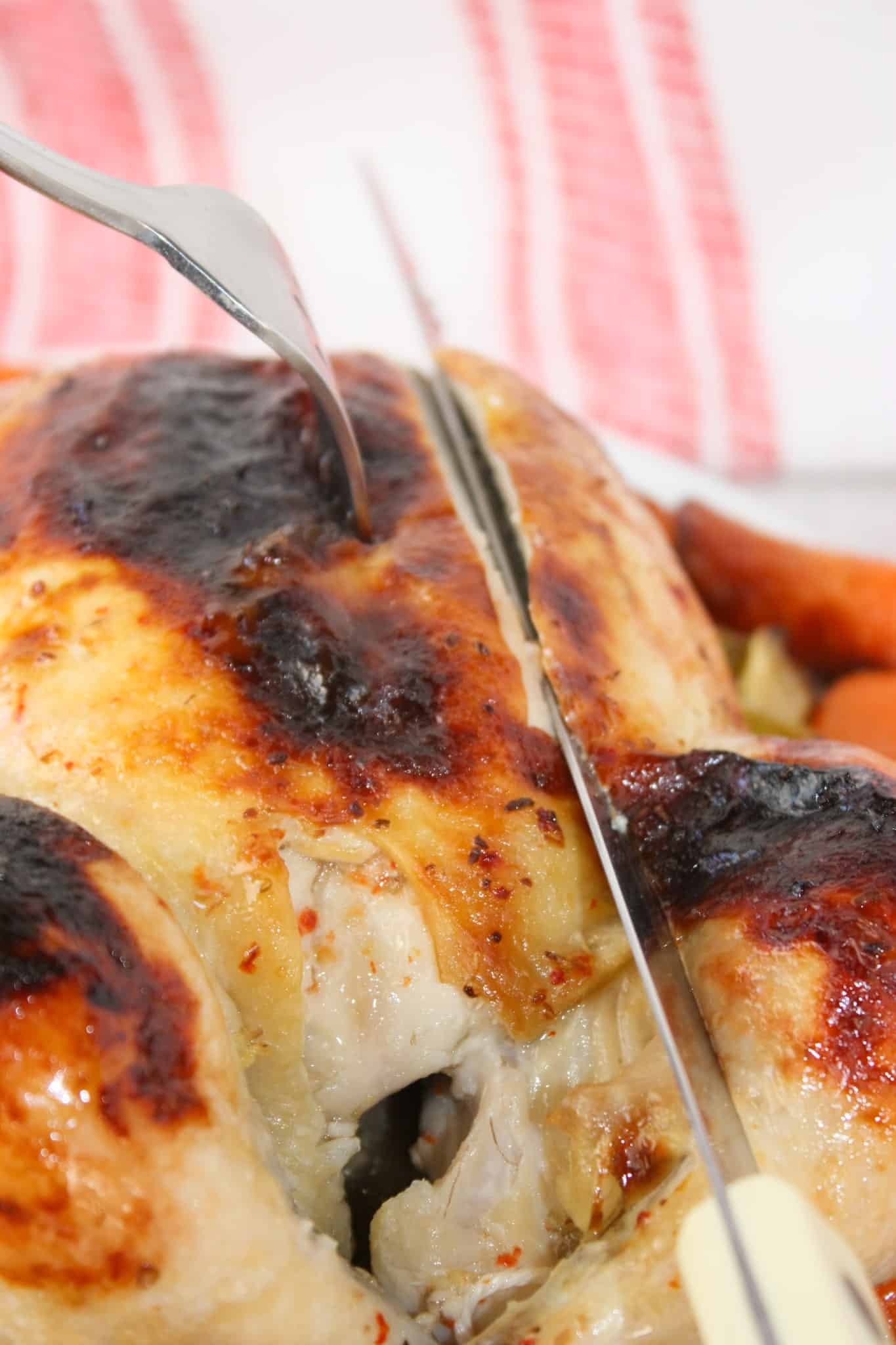 Easy Roast Chicken is bathed in Italian dressing and roasted to perfection. The skin is slightly charred and glistening, covered with a blend of herbs, garlic, and spices from the dressing that has caramelized during roasting.