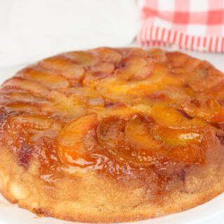 Peach Raspberry Upside Down Cake is a visually stunning dessert featuring a juicy, caramelized fruit topping over a soft, tender cake.