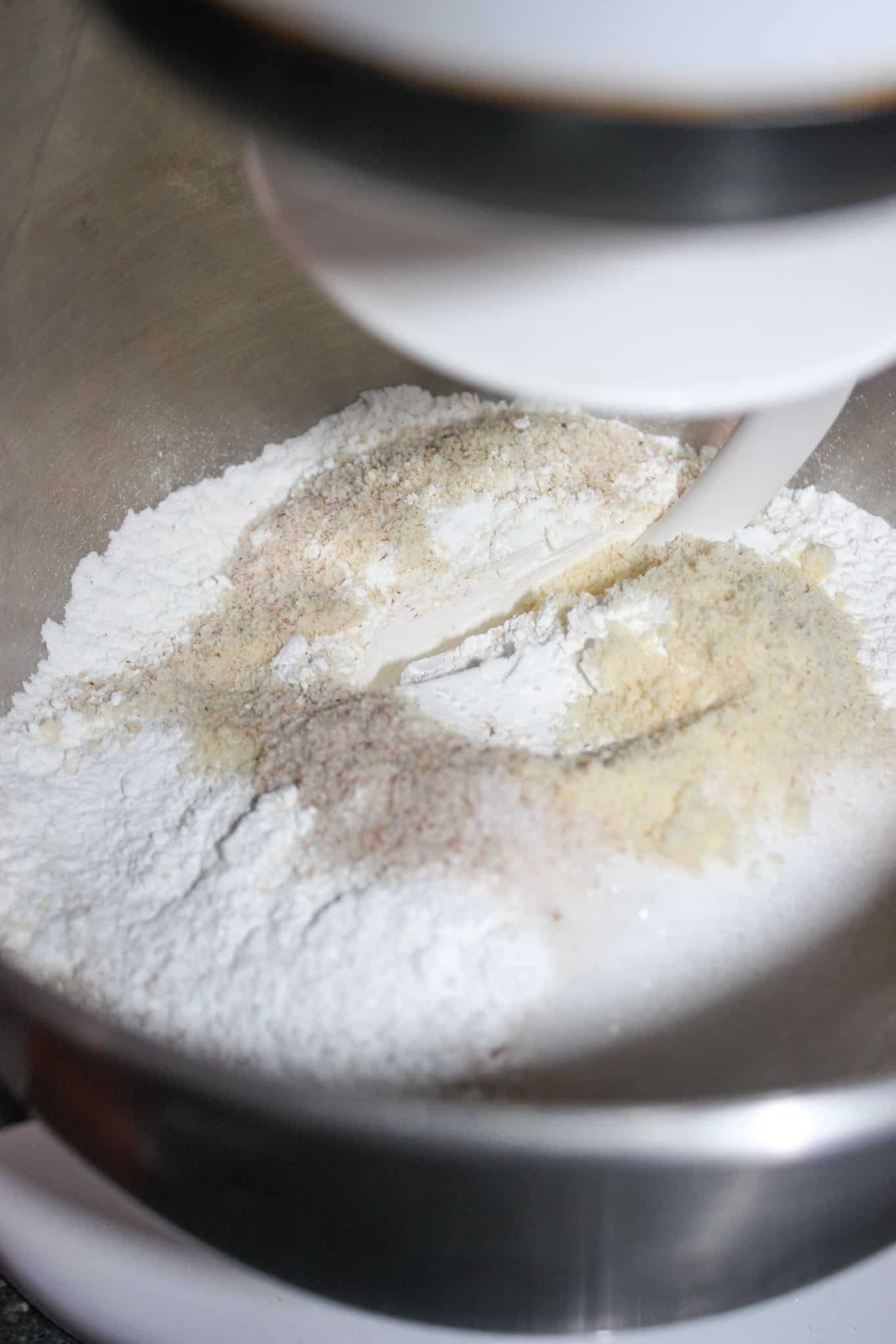 Mix the caputo flour, almond flour, psyllium husk powder, baking powder salt and sugar on low speed until blended.