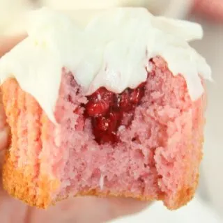 Raspberry cupcakes with raspberry pie filling are an indulgent twist on the classic dessert, combining the soft, fluffy texture of a cupcake with a luscious, fruity surprise. 