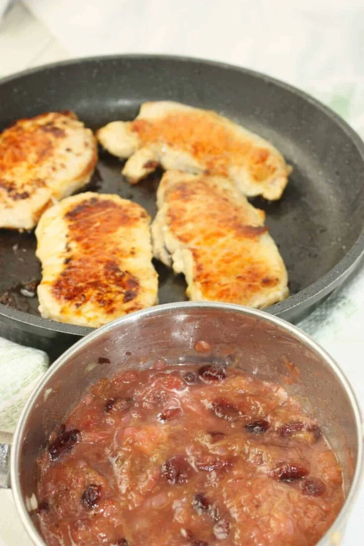 ork Chops with Rhubarb Cranberry sauce is sweet, tangy, and just a little bit unexpected.  This dish brings a seasonal twist to the dinner table.