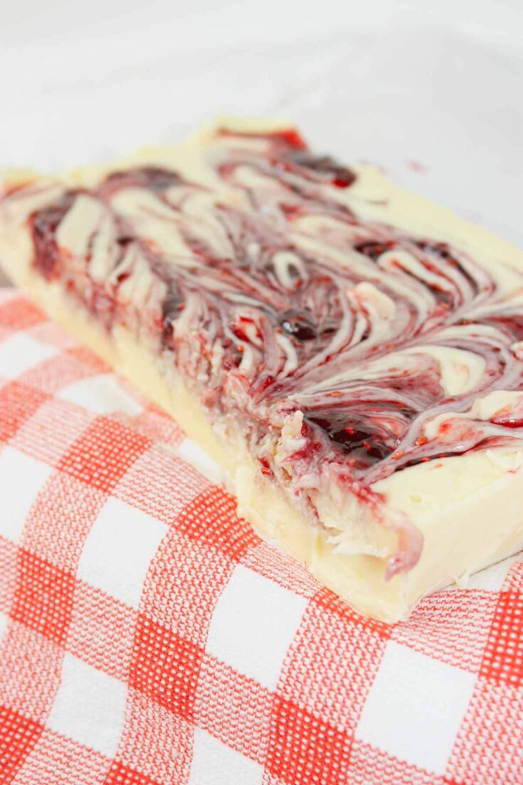 Microwave Raspberry Fudge is a creamy, dreamy treat that’s as easy as it is indulgent. Made with smooth white chocolate and sweetened condensed milk, it melts into a rich, velvety base in just minutes.
