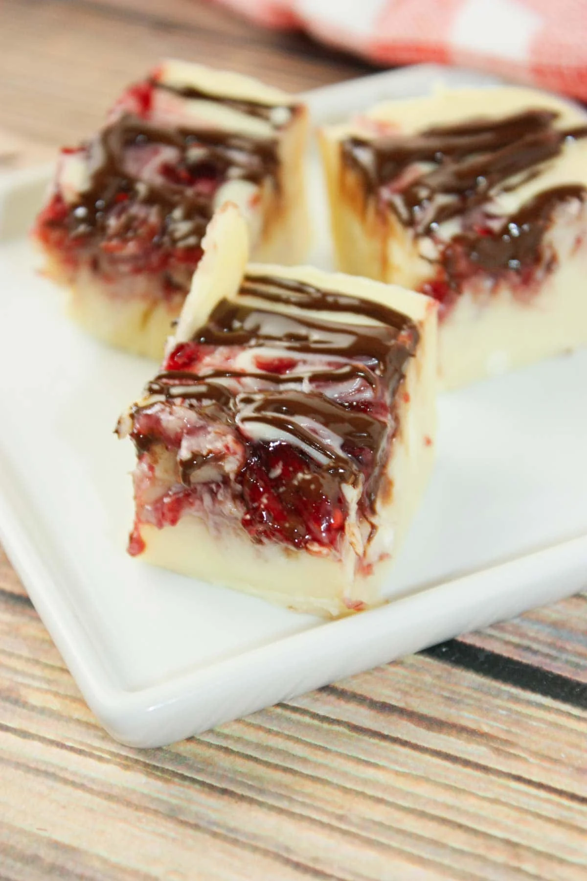 Microwave Raspberry Fudge is a creamy, dreamy treat that’s as easy as it is indulgent. Made with smooth white chocolate and sweetened condensed milk, it melts into a rich, velvety base in just minutes.