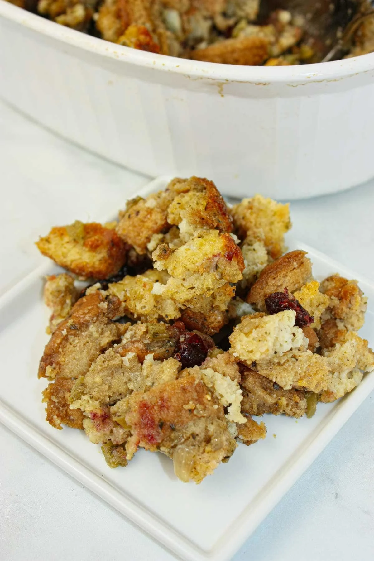 Gluten free oven stuffing bakes up golden and comforting, with a crisp top and a tender, savoury center.