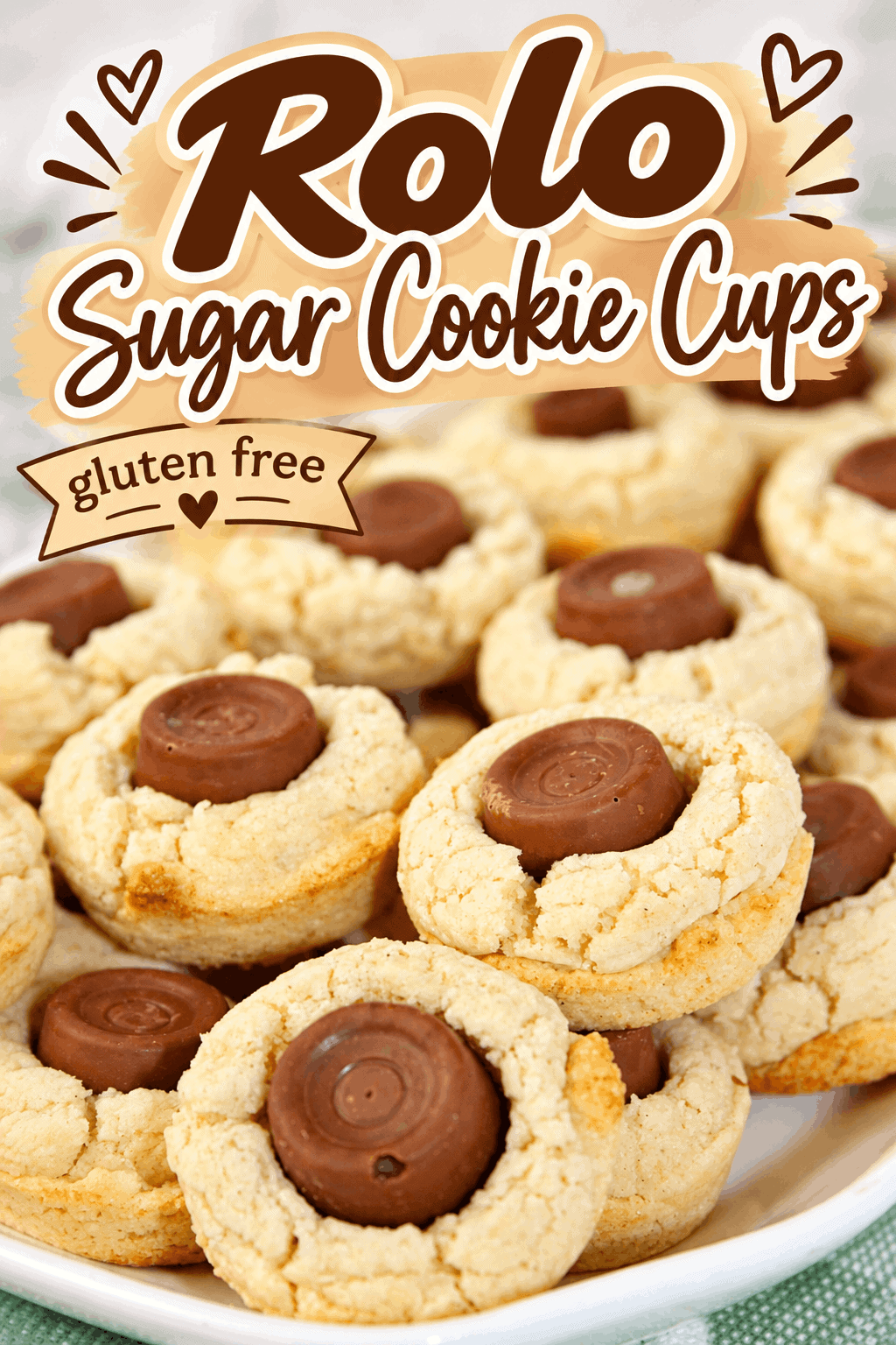 These Gluten Free Rolo Sugar Cookie Cups are a deliciously easy treat featuring soft, tender sugar cookie cups topped with a Rolo chocolate caramel candy. Perfect for holidays, parties, cookie trays, and everyday baking, these bite-sized desserts combine buttery gluten free sugar cookies with rich chocolate and gooey caramel. Save this easy gluten free cookie recipe for your next baking day! 🍪🍫