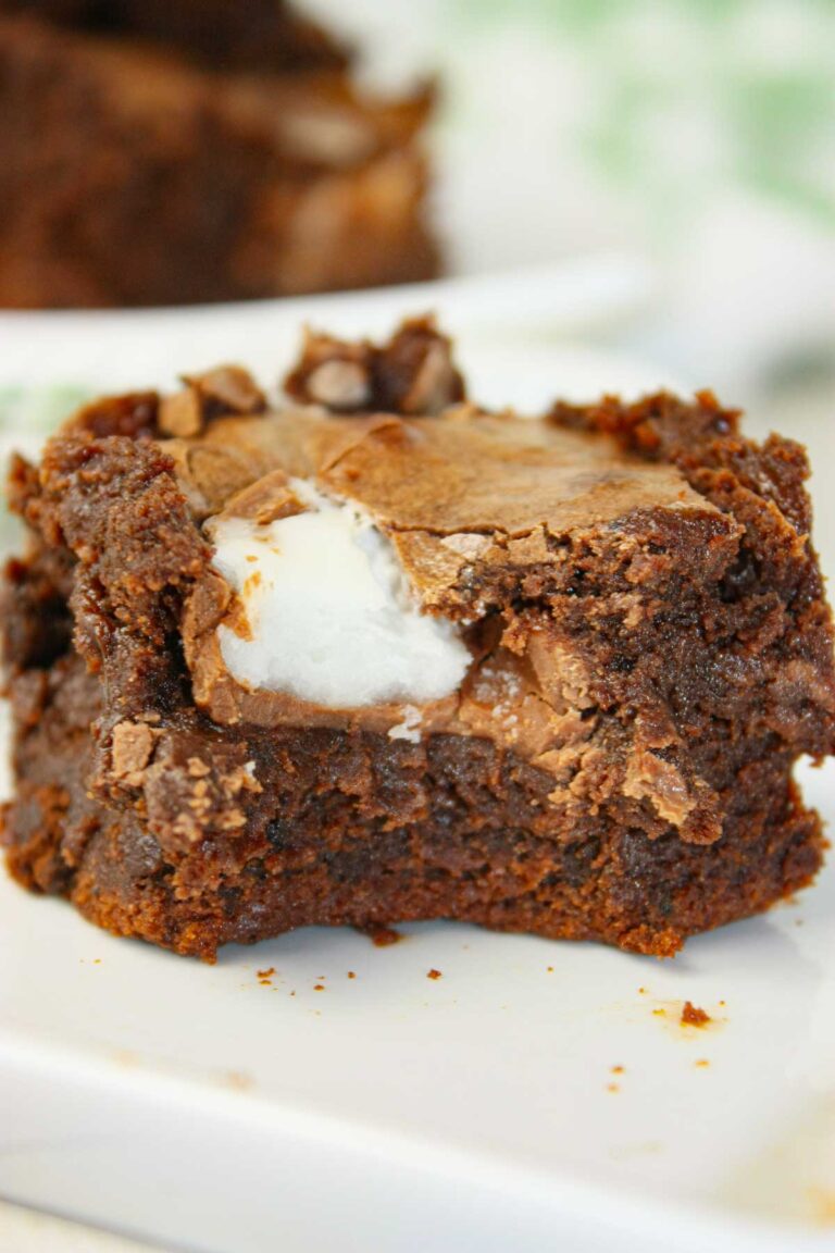 These Crème Egg Brownies are irresistibly rich, fudgy, and loaded with gooey chocolate goodness. Chunks of Cadbury Creme Egg melt into the batter, creating pockets of silky fondant sweetness.