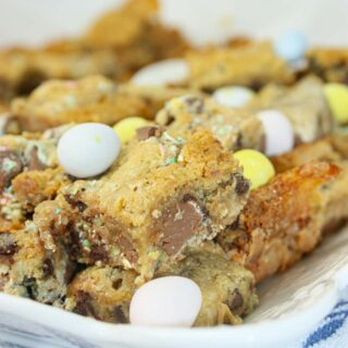 These Easter Cookie Squares are a dreamy layered dessert that combines everything you love about cookies and candy.