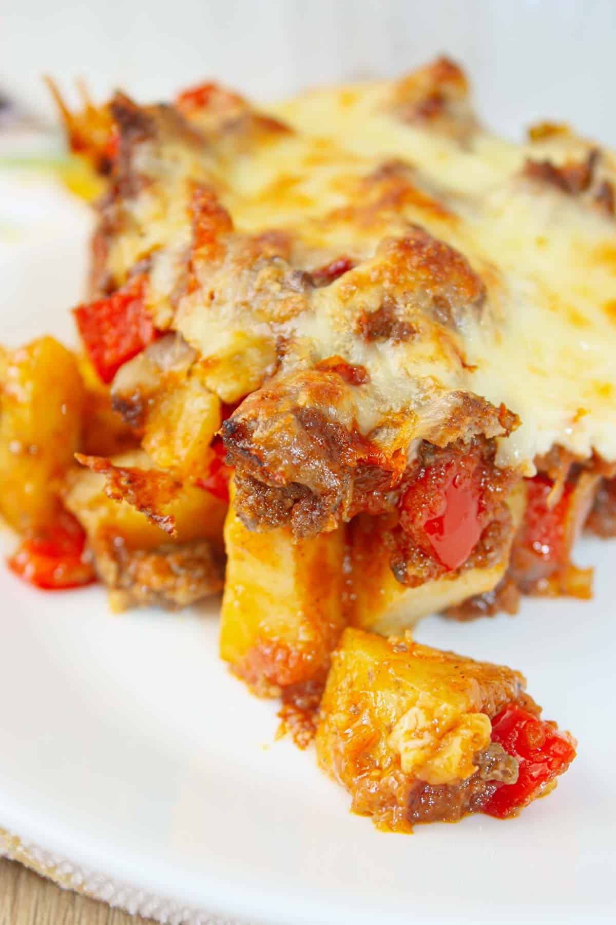 This hearty Mexican Ground Beef and Potato Casserole is layered with tender potatoes and savoury, seasoned ground beef.