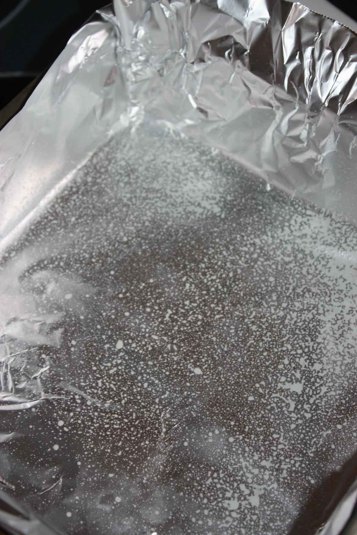 Line an 8" x 8" pan with tinfoil and spray lightly with cooking spray.