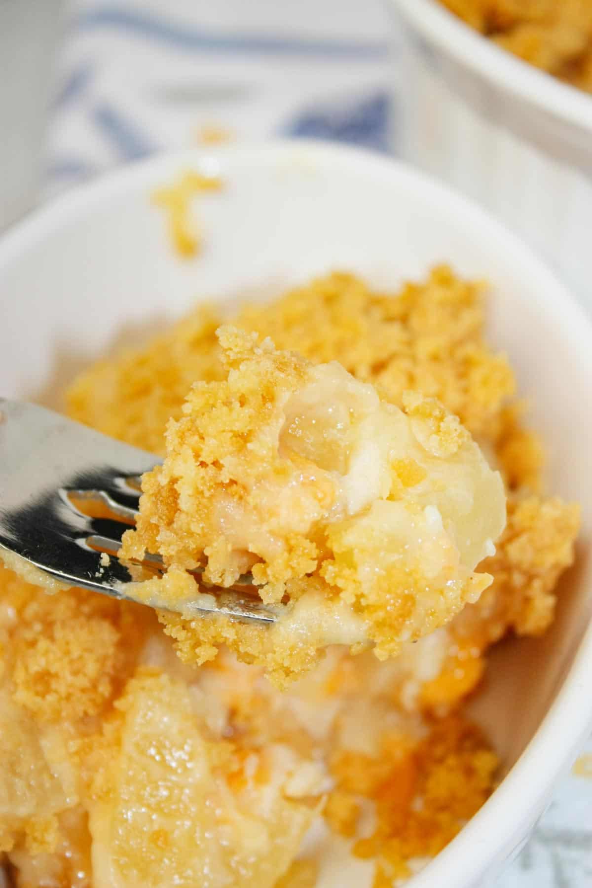 Pineapple Casserole is the perfect mix of sweet, buttery, cheesy, and crunchy in every bite. Juicy pineapple creates a bright tropical flavour that pairs beautifully with the rich topping.