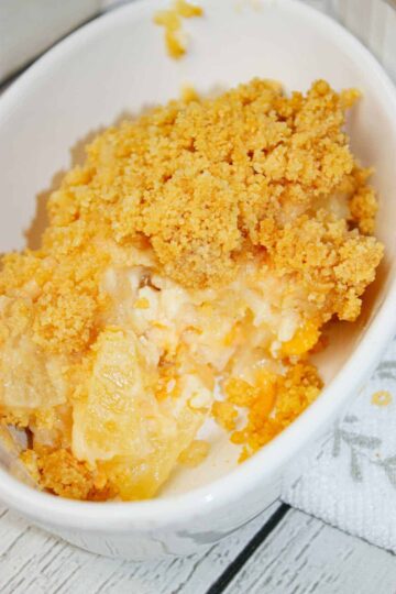 Pineapple Casserole is the perfect mix of sweet, buttery, cheesy, and crunchy in every bite. Juicy pineapple creates a bright tropical flavour that pairs beautifully with the rich topping.