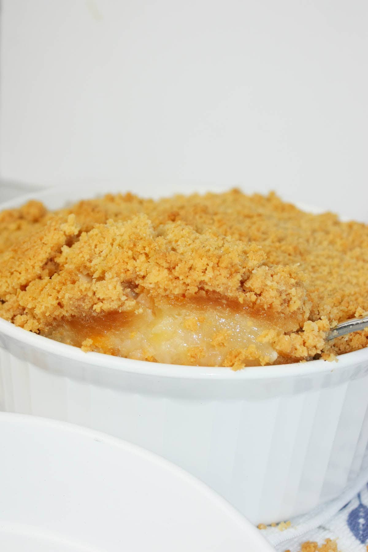 Pineapple Casserole is the perfect mix of sweet, buttery, cheesy, and crunchy in every bite. Juicy pineapple creates a bright tropical flavour that pairs beautifully with the rich topping.