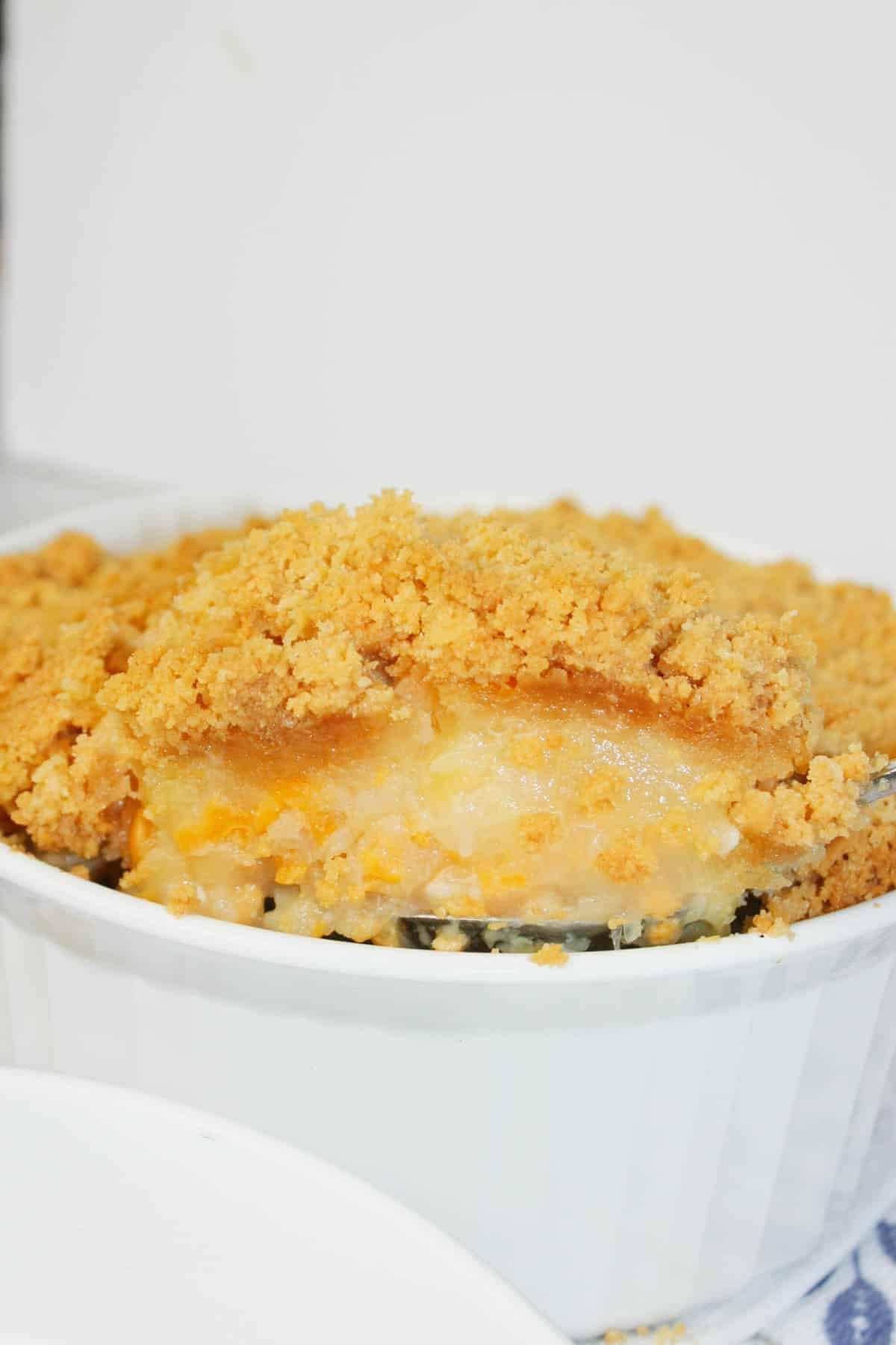 Pineapple Casserole is the perfect mix of sweet, buttery, cheesy, and crunchy in every bite. Juicy pineapple creates a bright tropical flavour that pairs beautifully with the rich topping.