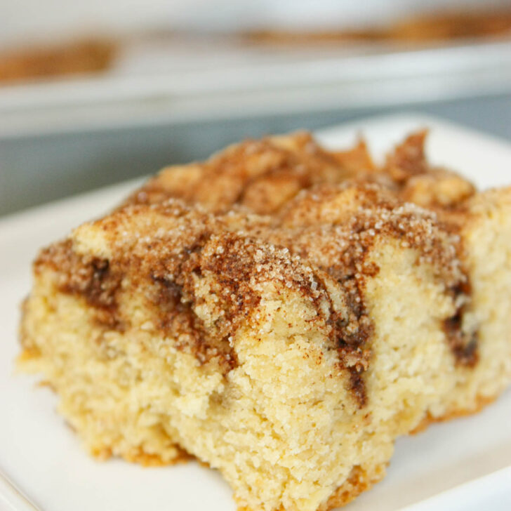 This Cinnamon Coffee Cake is soft, moist, and filled with warm cinnamon flavour in every bite. This gluten free cake brings warmth and nostalgia to any table.