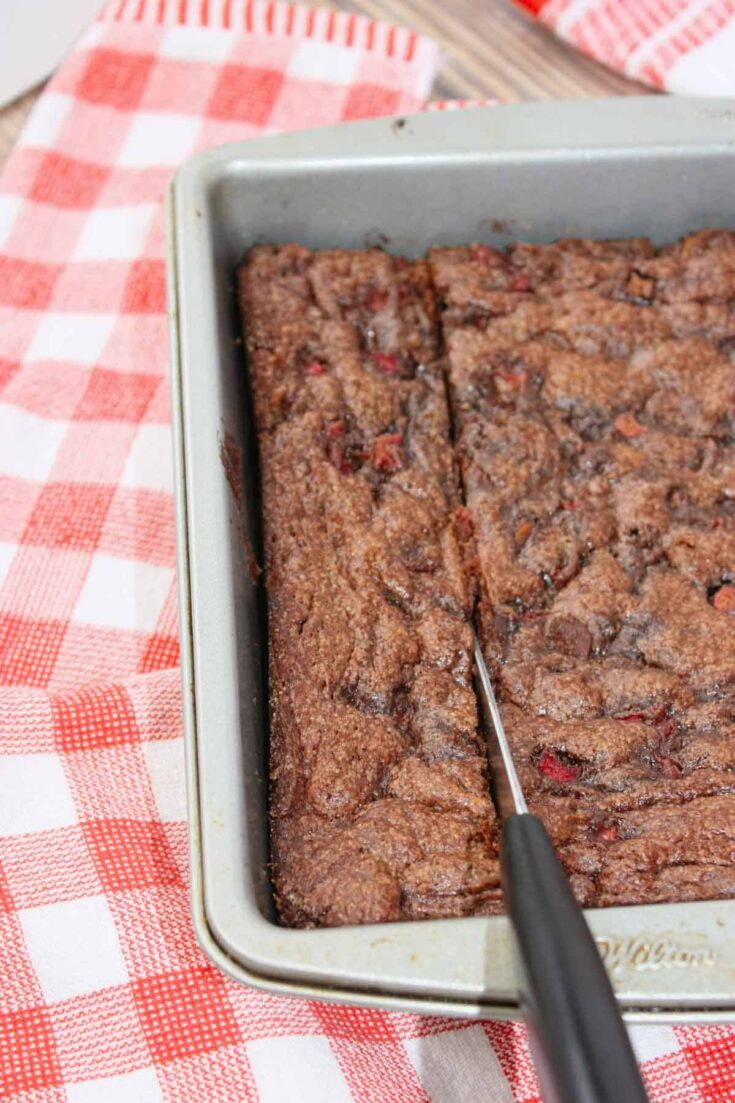 These Chocolate Rhubarb Brownies are a delightful twist on a classic dessert, combining the sweet richness of a soft, buttery brownie with the bright, tangy flavour of fresh rhubarb.
