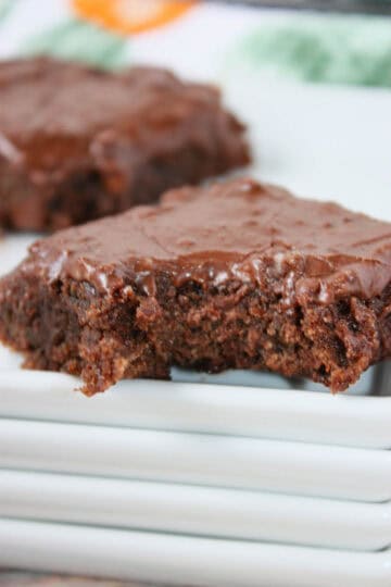 If you’re looking for a delicious way to use up fresh zucchini, these Zucchini Brownies are a must-try! They are rich, chocolatey, and packed with grated zucchini, making them a delicious homemade dessert that the whole family will enjoy.