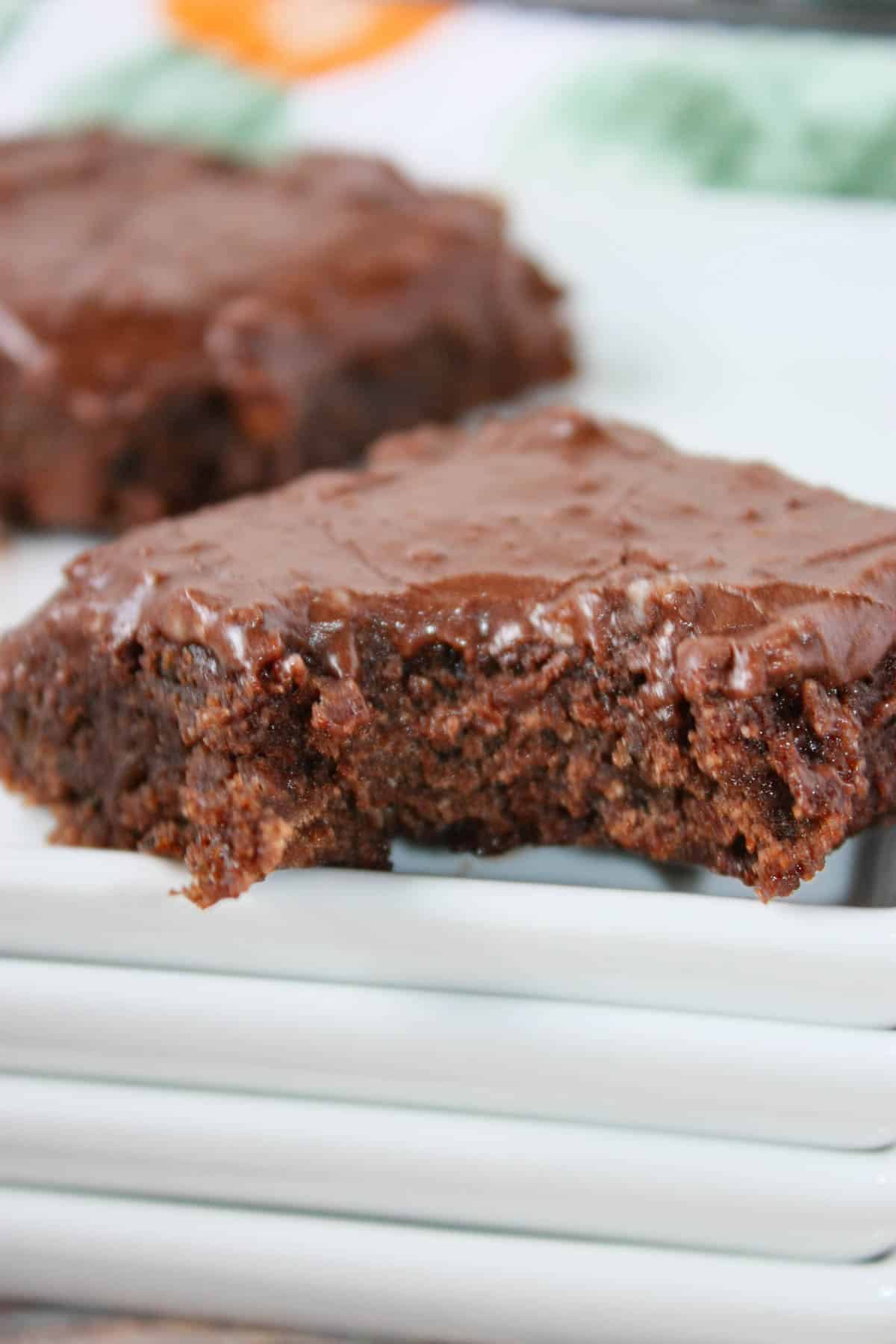 If you’re looking for a delicious way to use up fresh zucchini, these Zucchini Brownies are a must-try! They are rich, chocolatey, and packed with grated zucchini, making them a delicious homemade dessert that the whole family will enjoy.